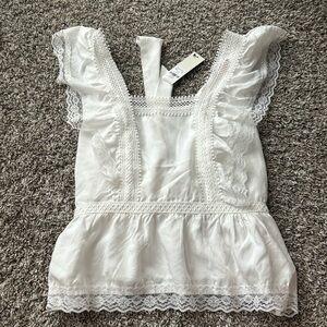 Francesca’s boutique! Such a pretty shirt! Beautiful lace!